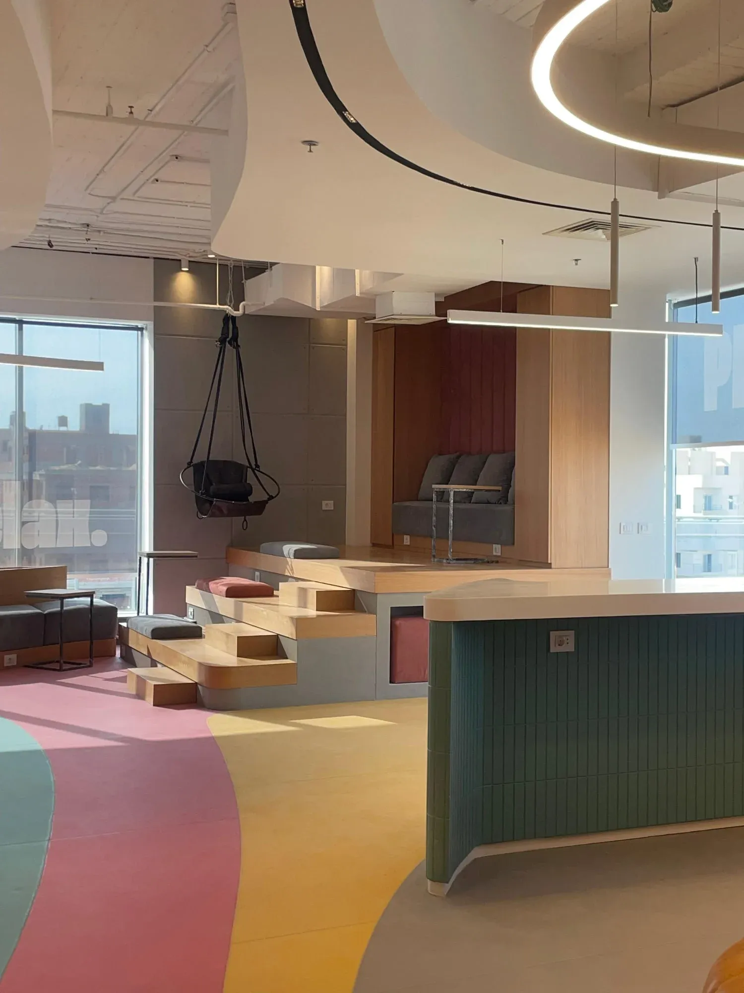 Overall view of the break area showing theater steps and seating arrangement