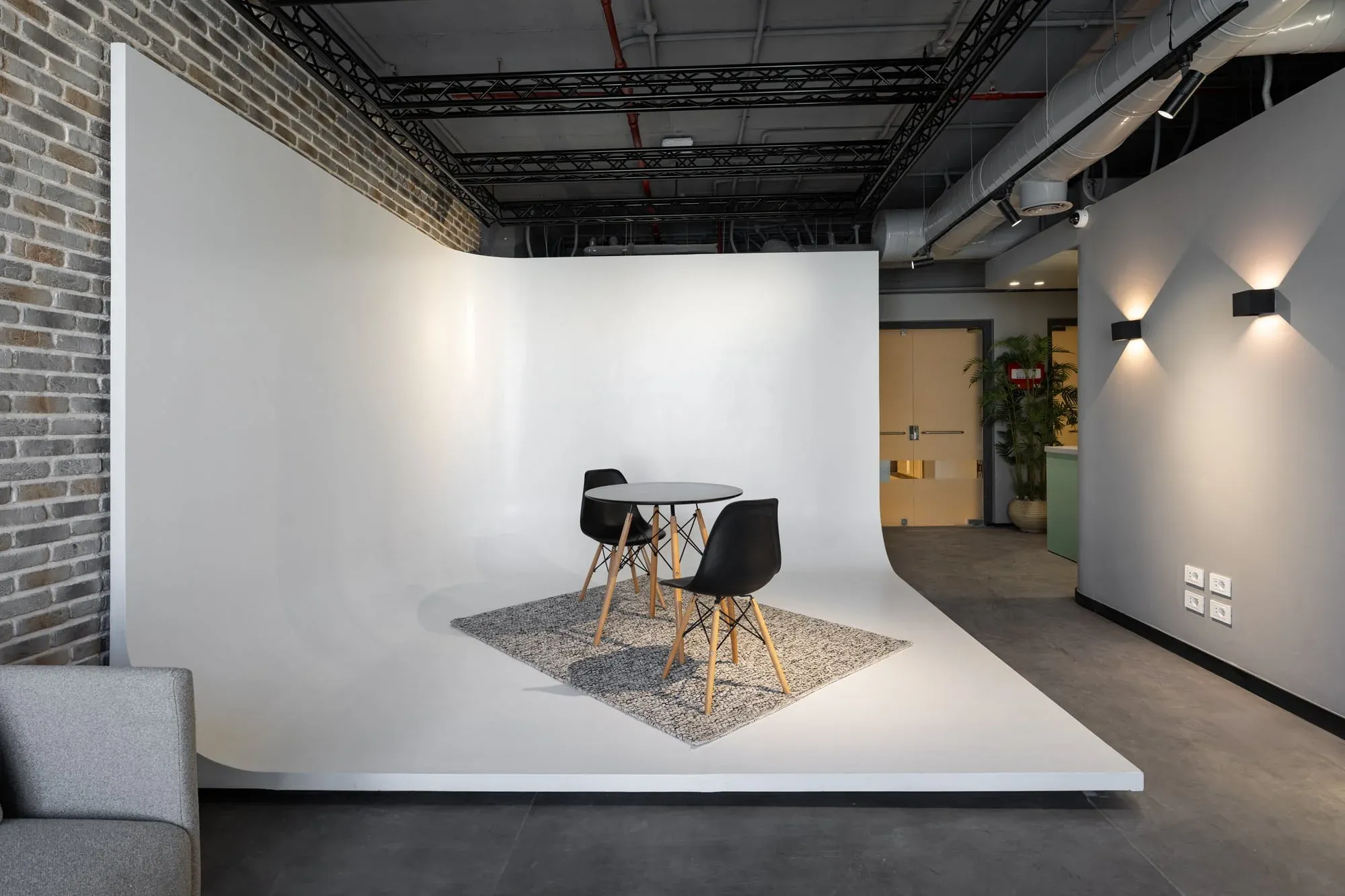 Detail of cyclorama curve showing smooth transition and camera-ready finish