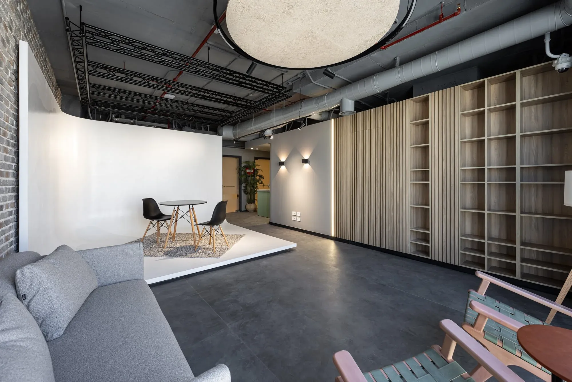 Overall studio view showing the wooden cyclorama backdrop and professional finish