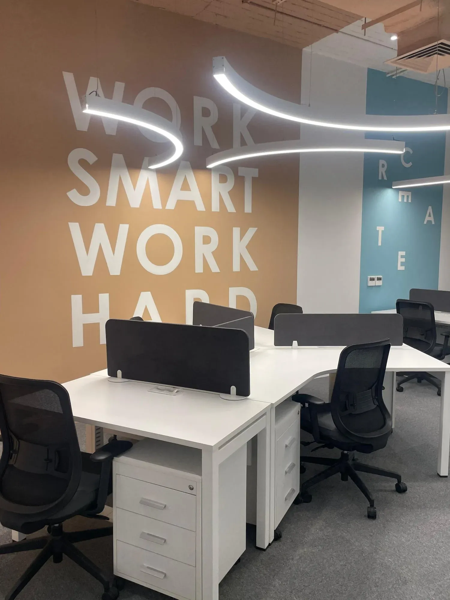 Employee workstation area showing organized drawer units and clean lines